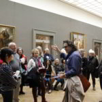 Prof. Yves M. Larocque giving a lecture at the Met during Walk the Arts annual bus tour to New York from Ottawa