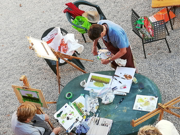 Group taking an art class during Walk the Arts painting holidays in Italy